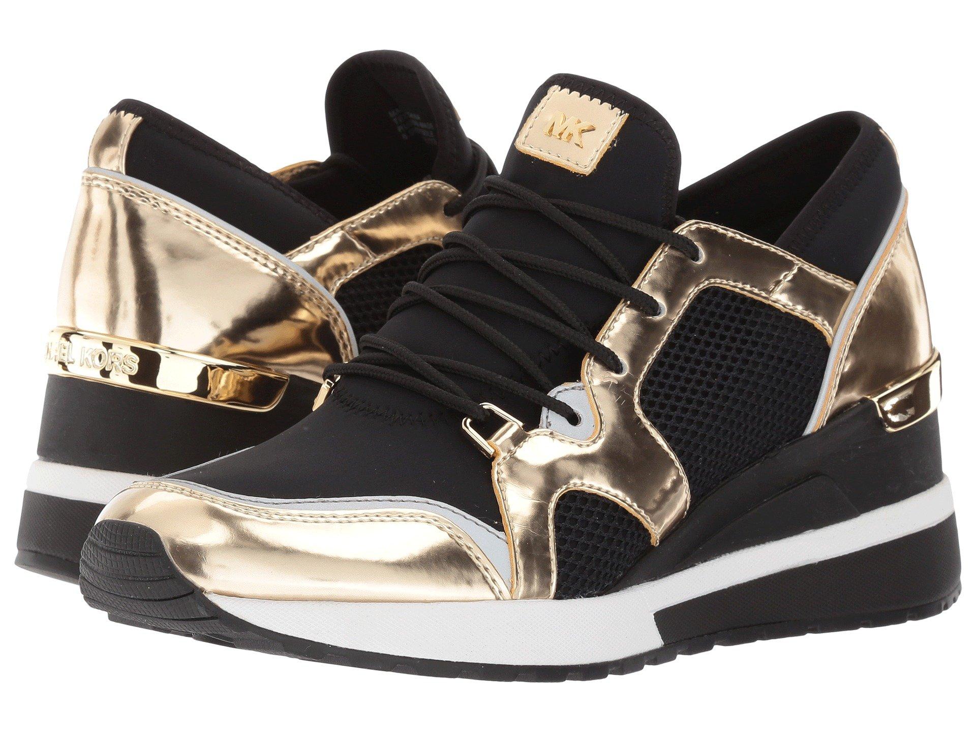 michael kors trainers black and gold