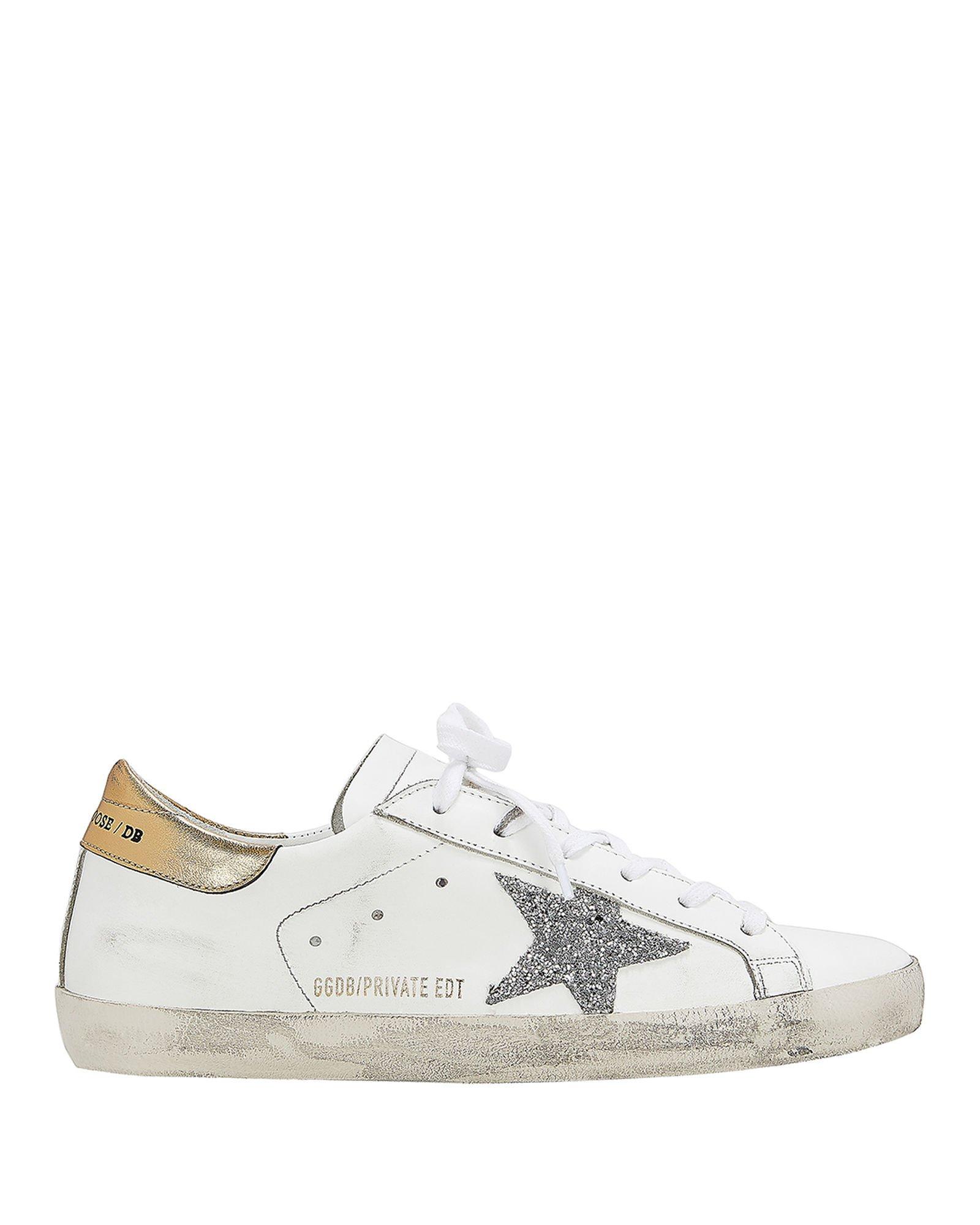 silver and gold golden goose