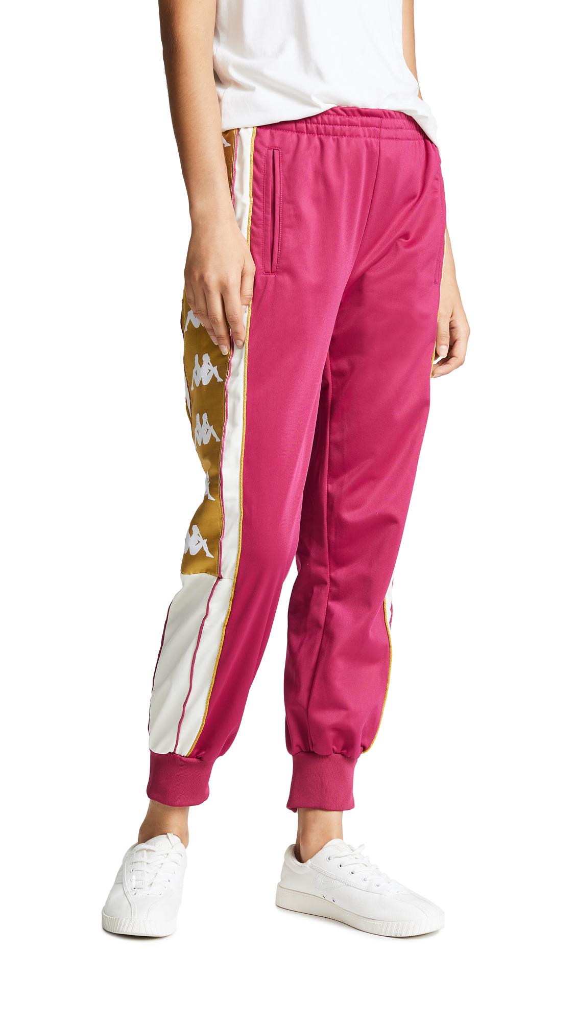 white and gold track pants