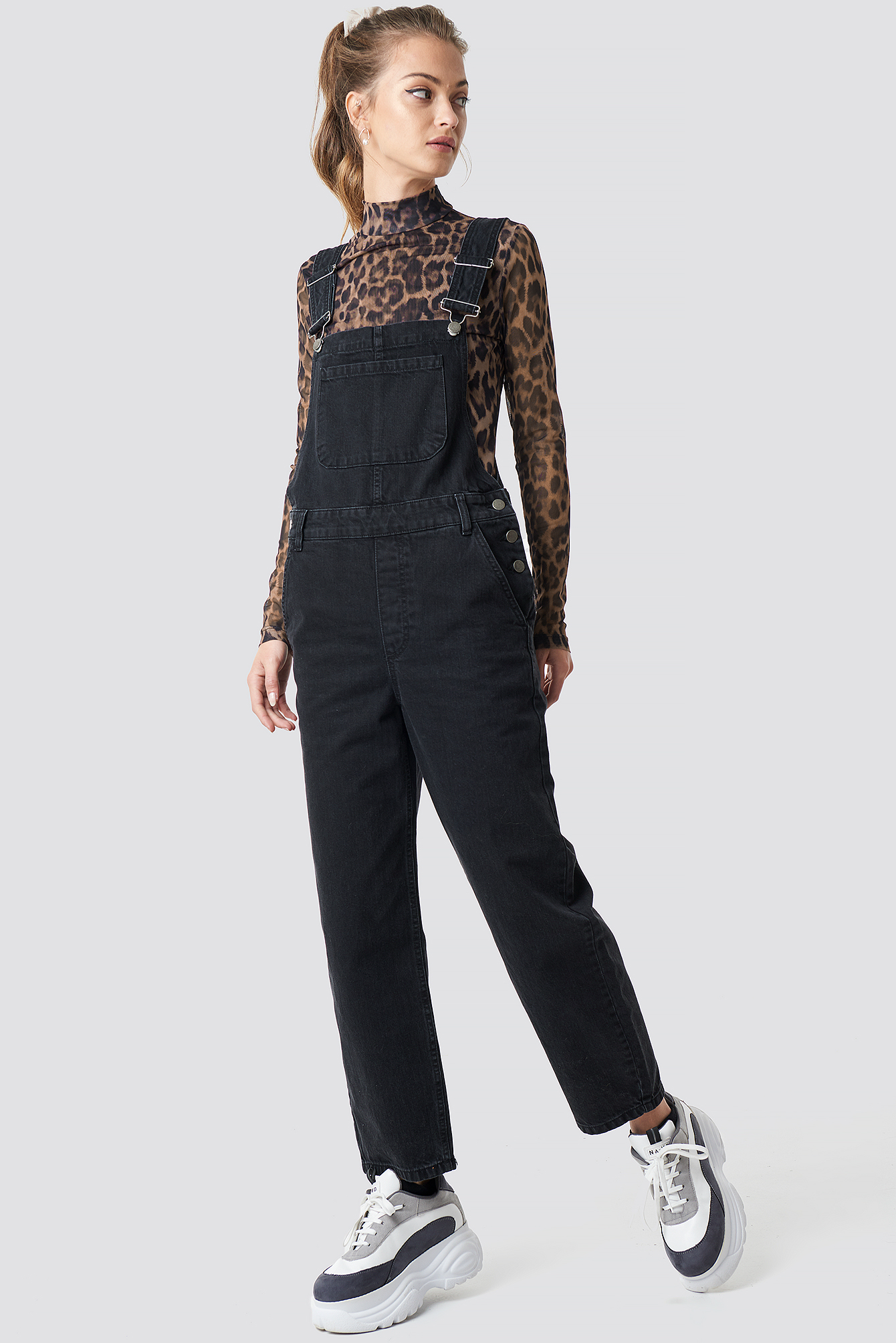 loose black dungarees