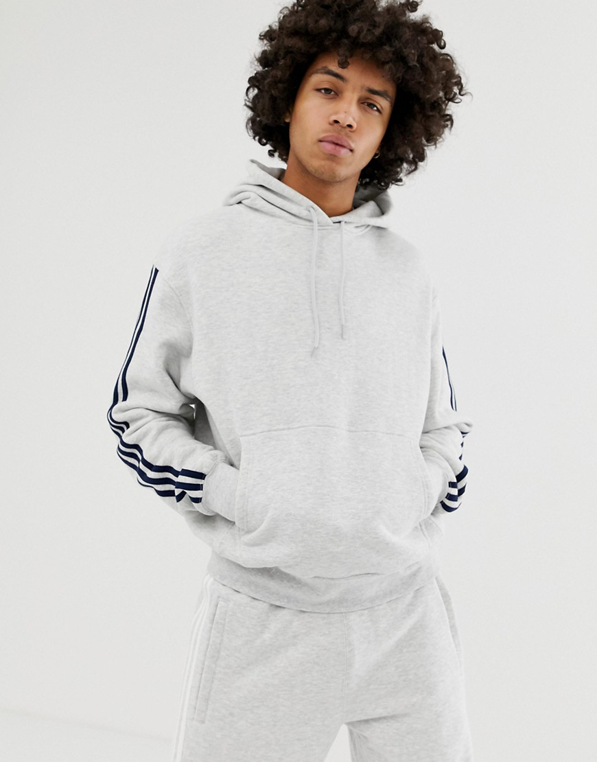 adidas originals floating stripe hoodie in black