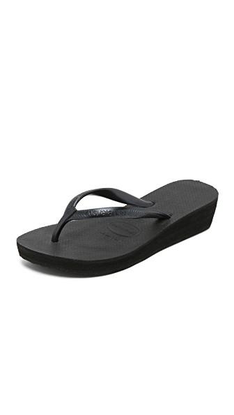 havaianas black wedge flip flops