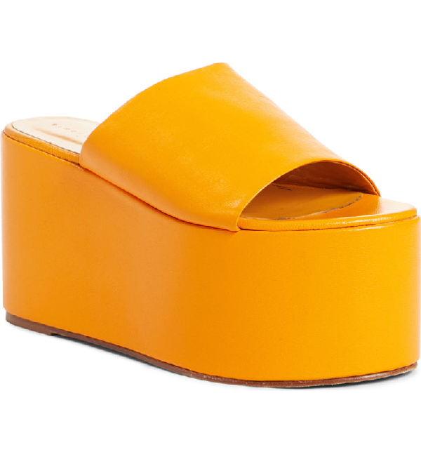 orange platform flip flops