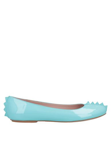 flats with turquoise soles