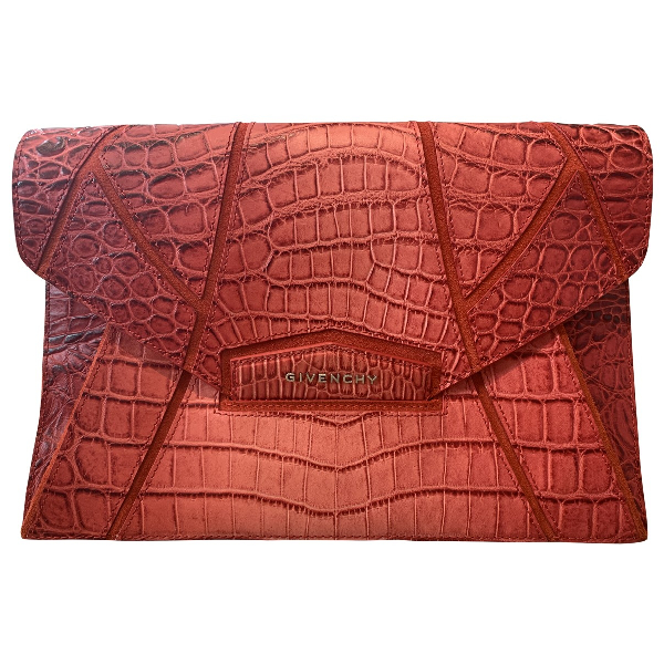 red leather clutch bag