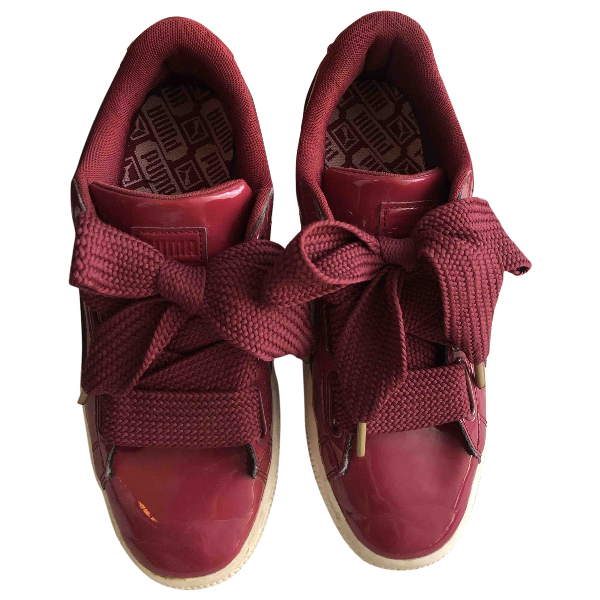 red patent leather pumas