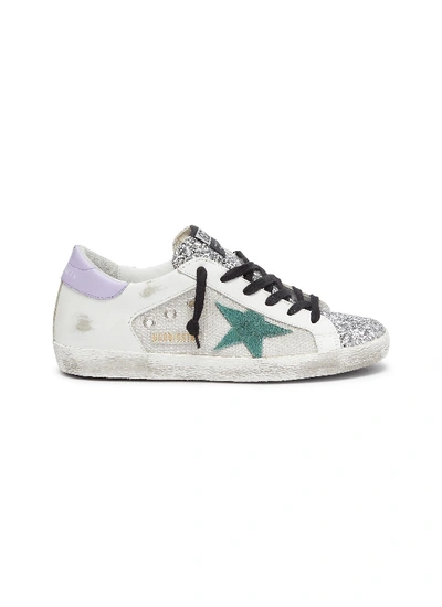 Shop Golden Goose superstar Glitter Tongue Contrasting Tab Sneakers In Metallic