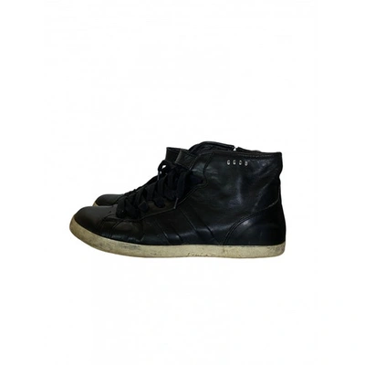GOLDEN GOOSE BLACK LEATHER TRAINERS