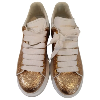 ALEXANDER MCQUEEN OVERSIZE GOLD LEATHER TRAINERS
