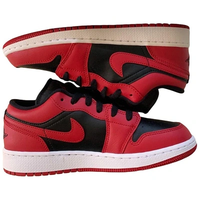 JORDAN 1  RED LEATHER TRAINERS