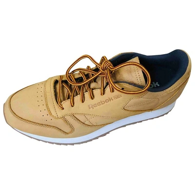 REEBOK YELLOW LEATHER TRAINERS