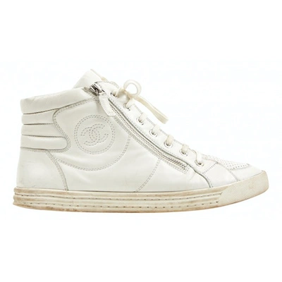 CHANEL WHITE LEATHER TRAINERS