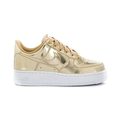 NIKE W AIR FORCE 1 SNEAKERS IN GOLD LEATHER