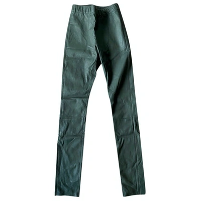 NOUR HAMMOUR GREEN LEATHER TROUSERS