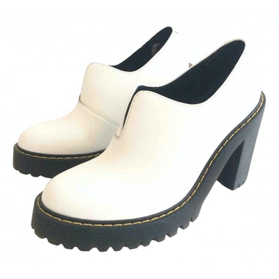 DR. MARTENS' WHITE LEATHER HEELS