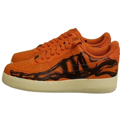 NIKE AIR FORCE 1 ORANGE RUBBER TRAINERS