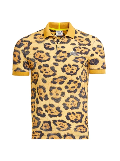 Shop Lacoste Men s Mini Pique Giraffe print Polo In Leopard