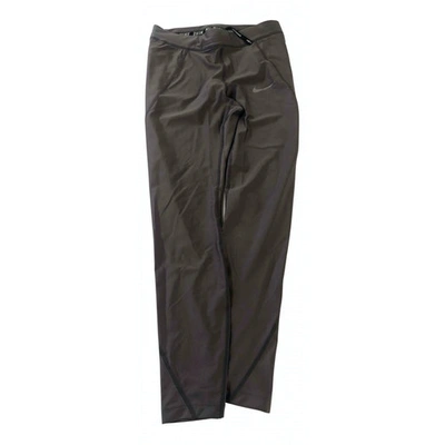 NIKE SILVER POLYESTER TROUSERS