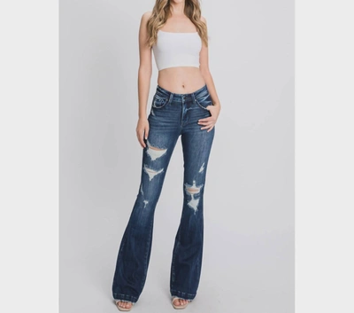 PETRA TARA MID RISE DISTRESSED FLARE SLIMMING JEAN IN DARK WASH