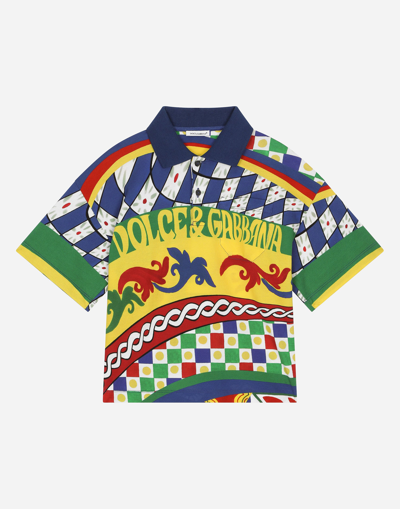 DOLCE & GABBANA SHORT-SLEEVED POLO-SHIRT IN CARRETTO-PRINT COTTON PIQUÉ