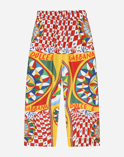 DOLCE & GABBANA CARRETTO-PRINT TWILL PANTS WITH CONTRASTING PIPING