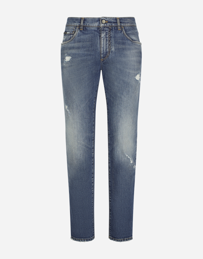 DOLCE & GABBANA LIGHT BLUE SLIM-FIT STRETCH JEANS WITH ABRASIONS