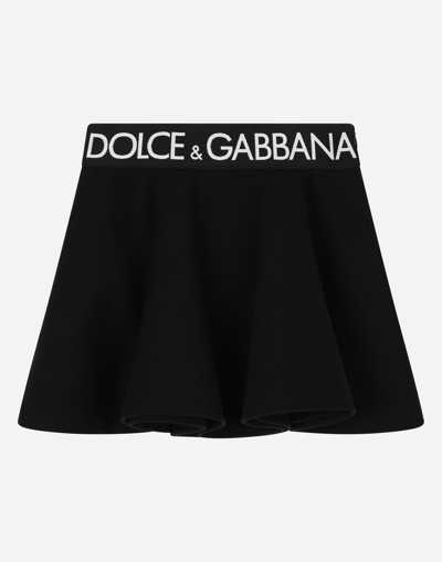 DOLCE & GABBANA CIRCLE MINISKIRT WITH BRANDED ELASTIC