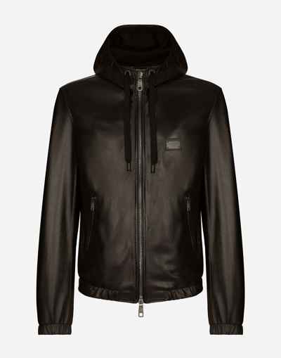 DOLCE & GABBANA LEATHER JACKET WITH HOOD AND BRANDED TAG