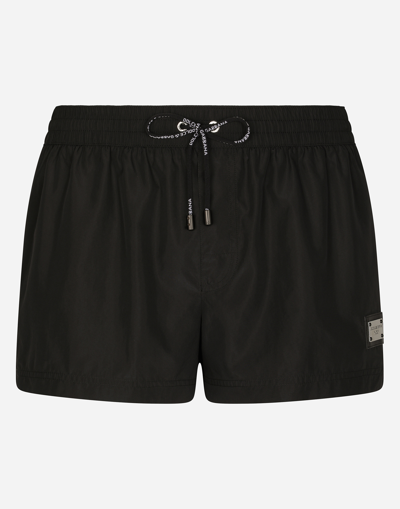 DOLCE & GABBANA SHORT SWIM TRUNKS WITH BRANDED TAG