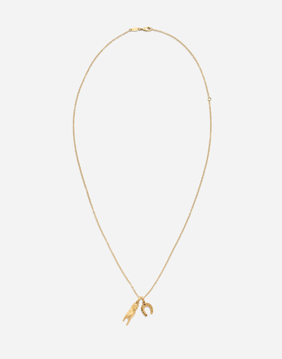 DOLCE & GABBANA GOOD LUCK HAND WITH HORN AND HORSESHOE PENDANTS ON YELLOW GOLD CHAIN