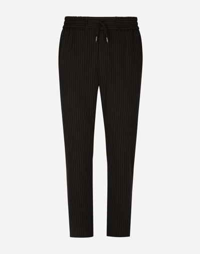 DOLCE & GABBANA PINSTRIPE JERSEY JOGGING PANTS WITH DG PATCH