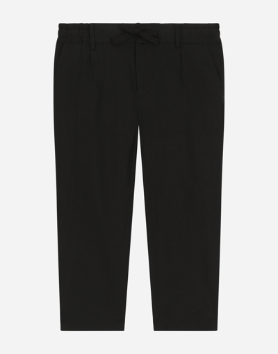 DOLCE & GABBANA STRETCH POPLIN PANTS WITH LOGO TAG