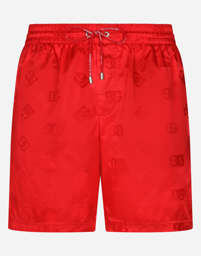 DOLCE & GABBANA MID-LENGTH SWIM TRUNKS WITH DG MONOGRAM PRINT