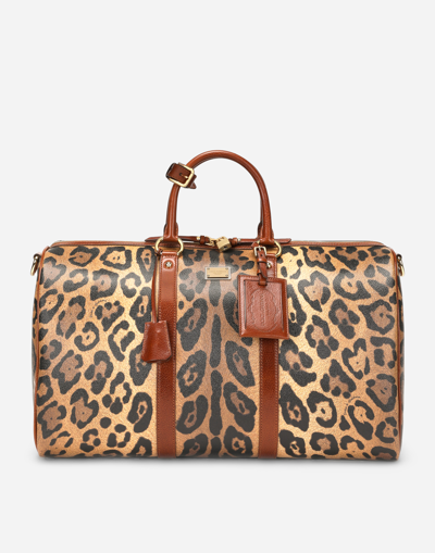 DOLCE & GABBANA MEDIUM TRAVEL BAG IN LEOPARD-PRINT CRESPO WITH BRANDED PLATE