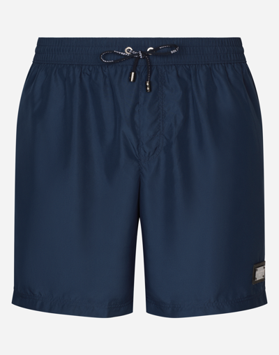 DOLCE & GABBANA LONG-LEG SWIM TRUNKS WITH BRANDED TAG