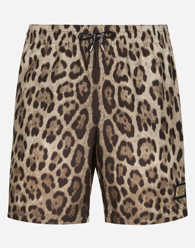 DOLCE & GABBANA MID-LENGTH SWIM TRUNKS WITH LEOPARD PRINT