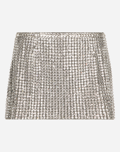 DOLCE & GABBANA MINISKIRT WITH FUSIBLE RHINESTONES