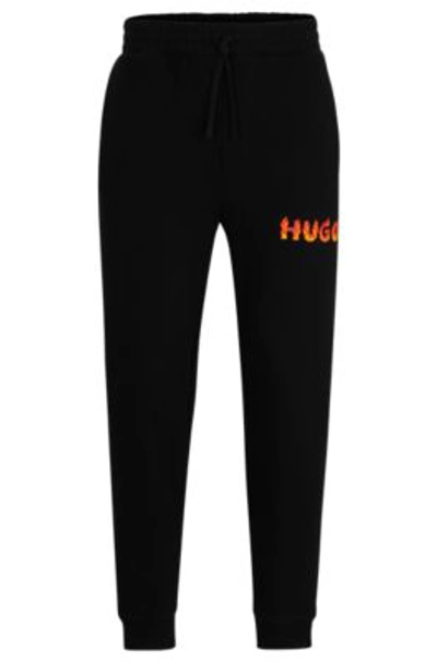 HUGO BOSS COTTON-TERRY TRACKSUIT BOTTOMS WITH PUFFED FLAME LOGO