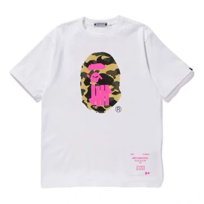 A BATHING APE A Bathing Ape x UNDEFEATED Shanghai limited Ape Head Tee 'White Pink'
