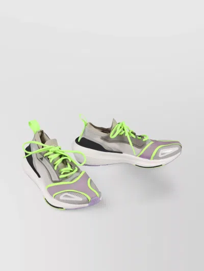 ADIDAS BY STELLA MCCARTNEY PERFORMANCE SNEAKERS FEATURING NEON ACCENTS