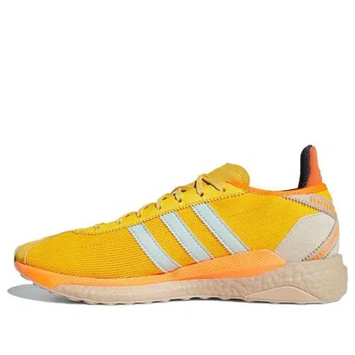 ADIDAS ORIGINALS adidas x Pharrell Tokio Solar Hu 'Yellow Orange'