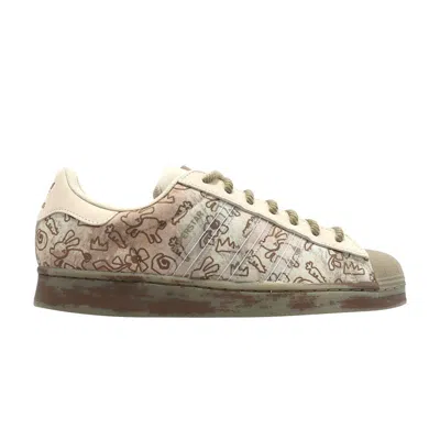 ADIDAS ORIGINALS MELTING SADNESS X SUPERSTAR 'ALLOVER GRAPHICS - CLEAR BROWN'