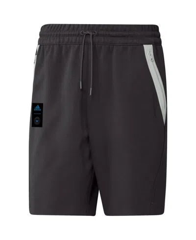 ADIDAS ORIGINALS MEN'S ADIDAS BLACK CHARLOTTE FC 2023 PLAYER TRAVEL SHORTS