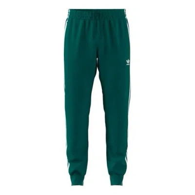 ADIDAS ORIGINALS adidas originals Sst Tp Logo Embroidered Sports Pants Green