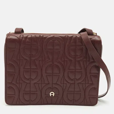 AIGNER BURGUNDY LOGO EMBOSSED LEATHER FLAP CROSSBODY BAG