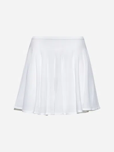 ALAÏA WHITE FINE KNIT SKATER MINI SKIRT