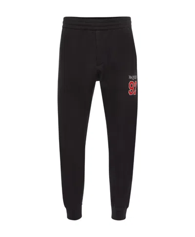 ALEXANDER MCQUEEN ALEXANDER MCQUEEN LOGO DETAILED JOGGING PANTS