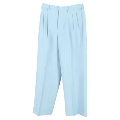 AMI ALEXANDRE MATTIUSSI AMI PARIS PLEATED TROUSERS IN LIGHT BLUE WOOL