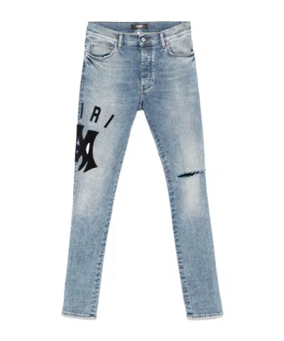 AMIRI LOGO-APPLIQUÉ SKINNY JEANS