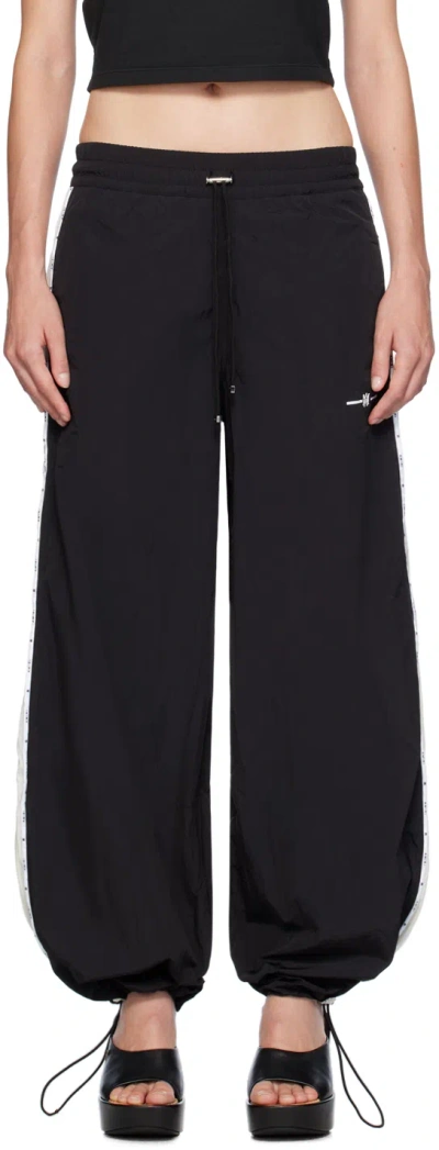 AMIRI BLACK RAGLAN MA TRACK PANTS